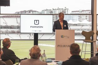 Andy Carroll presents Farizon Auto and the all-electric SV to interested UK dealers and guests.